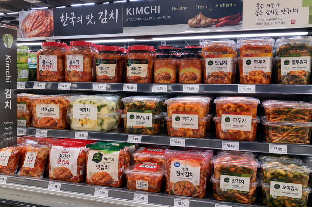 Refrigerated kimchi section at a Korean grocery store